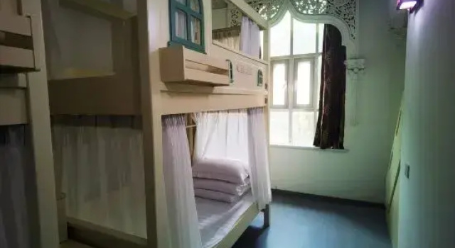 Кровать в общем номере (женский номер) Kashgar Ancient City Munag Hotel