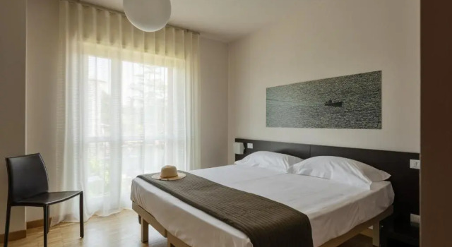 Апартаменты c 1 комнатой с балконом и с видом на озеро Vialeromadodici Rooms & Apartments