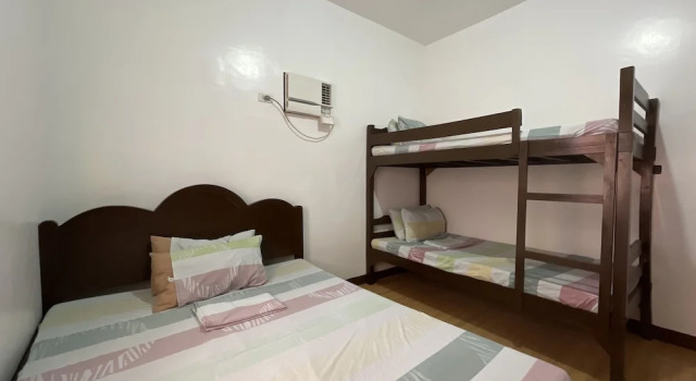Кровать в общем номере Poracay Resort