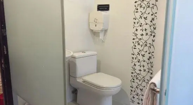 Кровать в общем номере New Garden Hostel