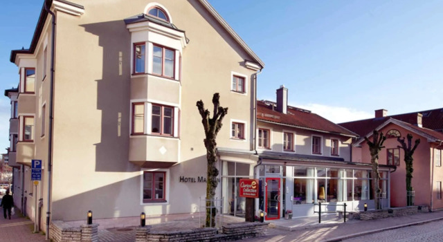 Кровать в общем номере Home Hotel Majoren