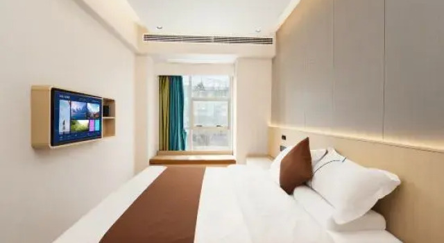 Двухместный семейный люкс Deluxe с красивым видом из окна Chengdu Xiyuan Apartment Hotel(喜源精品公寓(成都春熙太古里店))