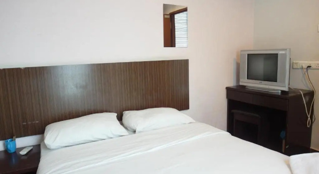 Номер Deluxe Li Garden Hotel