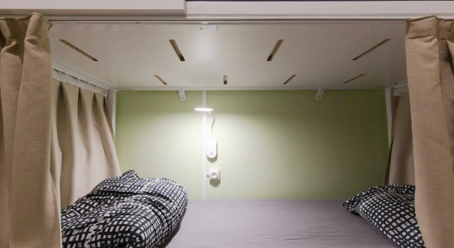 Кровать в общем номере Backpackers House