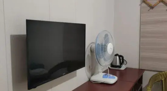 Номер Economy Mengzhou Wangjia Inn