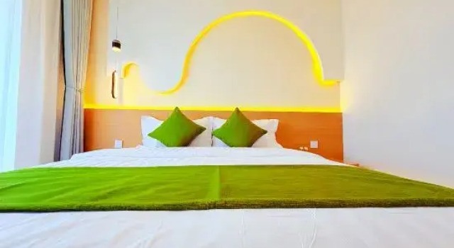 Кровать в общем номере с 4 комнатами Xi'an Gudu House Apartment