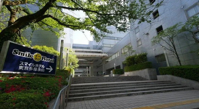 Кровать в общем номере Smile Hotel Tokyo-Tamanagayama