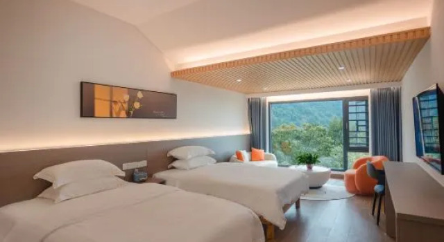 Семейный люкс Hengshan Palm Tree Garden Self-operated Homestay (Central Scenic Area)