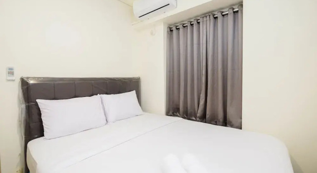 Homey and Cozy Living 1Br + Working Room at Meikarta Apartment
