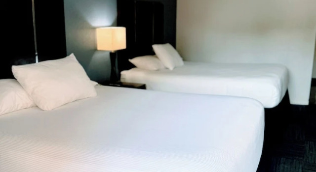 Четырёхместный номер Deluxe с балконом The Pacific Inn