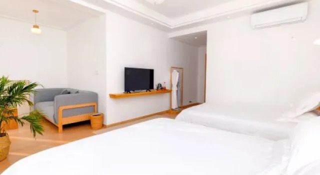 Кровать в общем номере с 6 комнатами Senduo·Tonglu Designer Vacation Stay DB&B