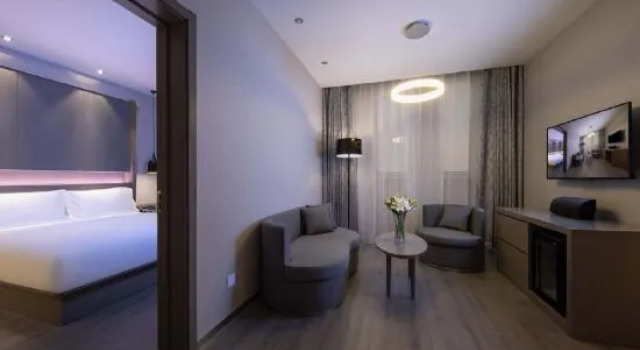 Люкс Deluxe Orange Hotel (Tianjin Jinnan University Town New I