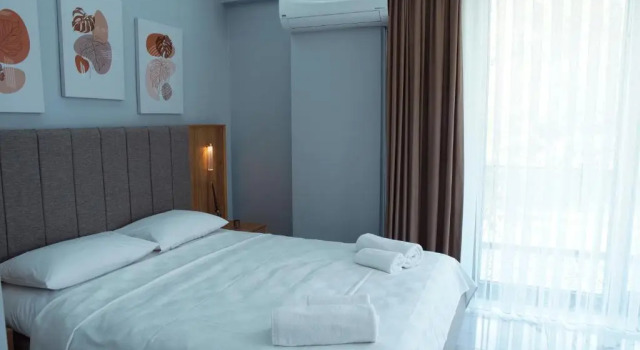 Standardowy czteroosobowy pokój z widokiem na ogród Didi Hotel