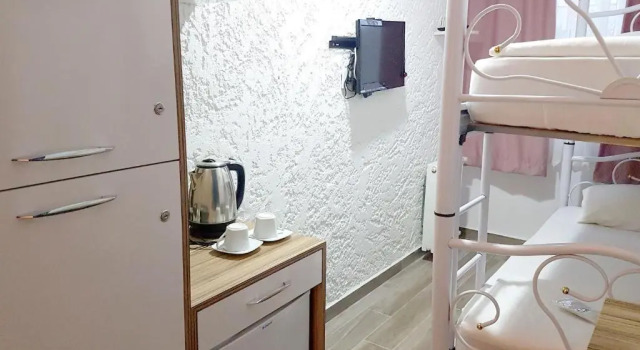 Кровать в общем номере AlaDeniz Hotel