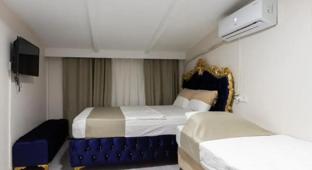 Трёхместный номер Deluxe Modena Hotel