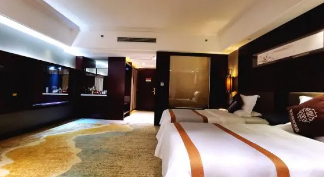 Номер Deluxe Huangting Lijing Hotel