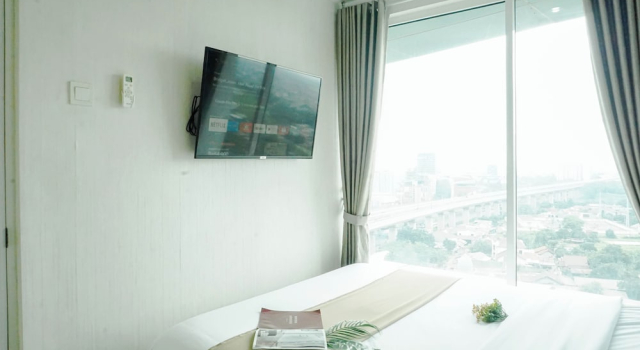 Апартаменты Standard Pleasant And Relaxing 2Br Apartment Grand Kamala Lagoon