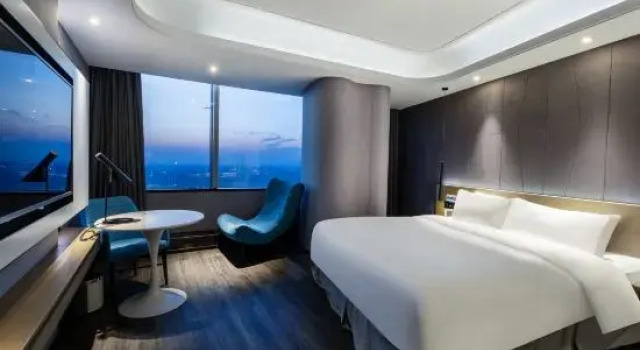 Номер Deluxe Mercure Hangzhou Qianjiang