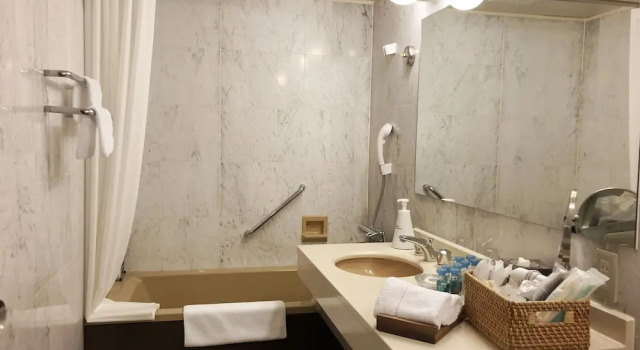 Кровать в общем номере Infinito Hotel and Spa