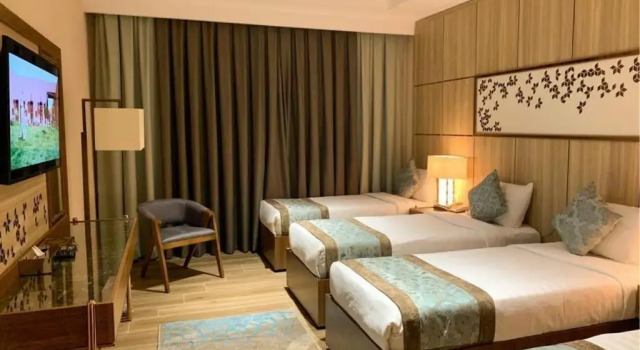 Четырёхместный номер Standard Midan Hotel & Suites Al Aziziya