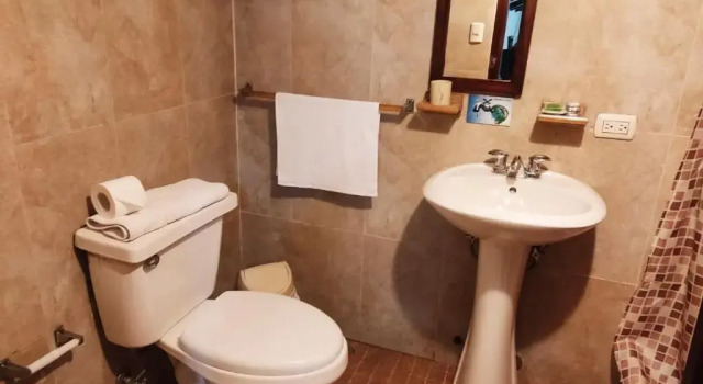 Кровать в общем номере Hotel Calle Angosta