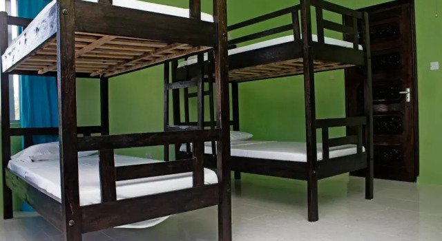 Кровать в общем номере Tulia House Backpackers