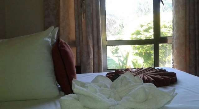 Okavango Roadside Guesthouse, Rezervovat Hotel Hotely v Ngamiland East s parkováním, Parkování
