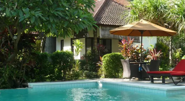 Кровать в общем номере Di Abian Resort