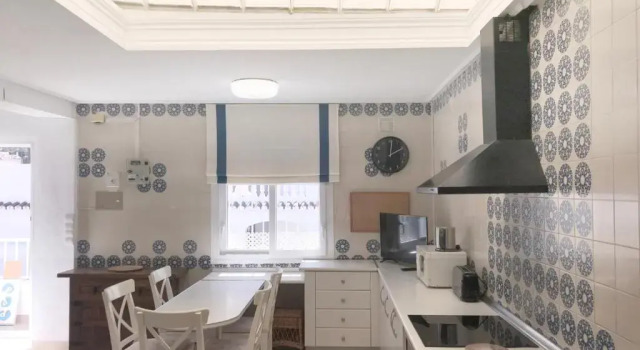 Кровать в общем номере с 6 комнатами Apartamentos Turísticos La Mundial