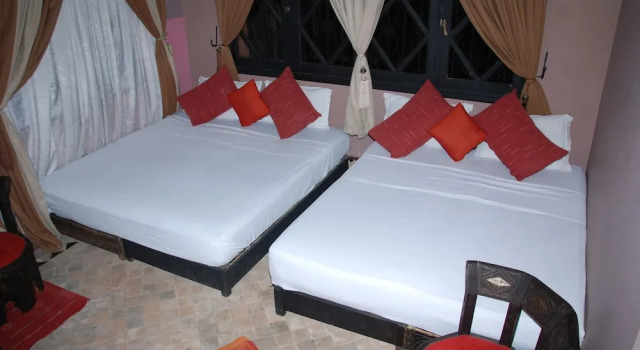 Camera quadrupla Premium con balcone Villa Guest