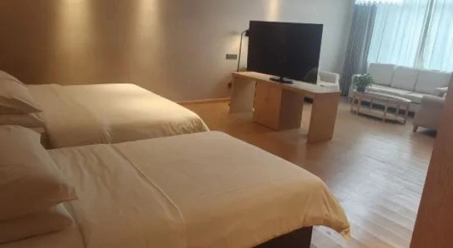 Люкс Deluxe Vienna International Hotel (Rizhao Wanxianghui Wanpingkou Scenic Area Store)