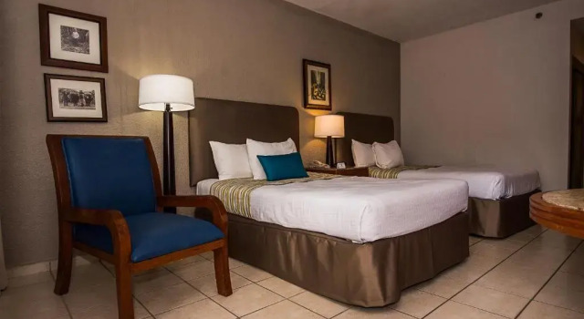 Четырёхместный номер Deluxe Rincon of the Seas Grand Caribbean Hotel