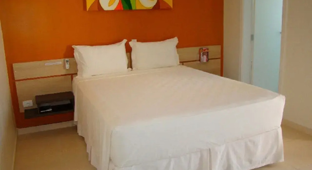Номер Standard Hotel Rosa da Ilha Guaruja - 80m do mar, 02 piscinas, sala de jogos, brinquedão de percurso para crianças