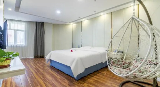 Люкс Business World Aladdin Hotel (Zibo Huantai Zhangbei Road Xinyu Building Branch)