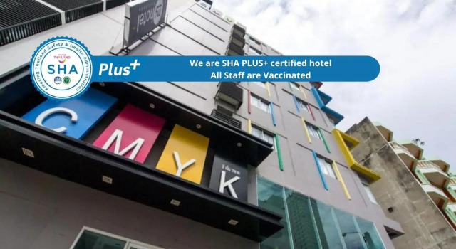 Кровать в общем номере CMYK Boutique Hotel