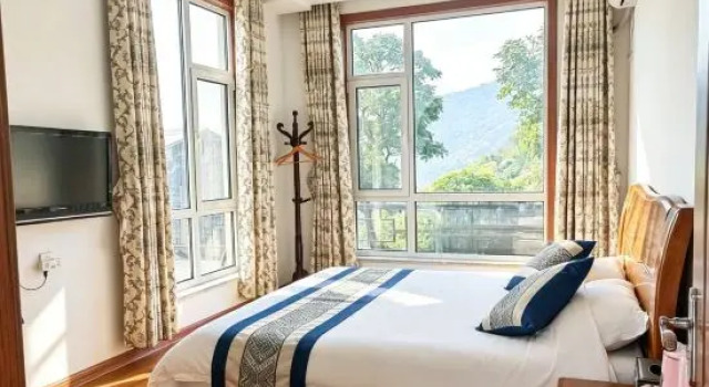 Люкс с 3 комнатами Qingdao Lingshan Island Chunshe Homestay