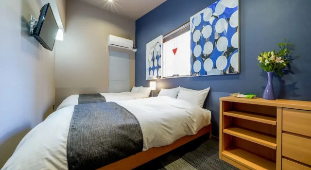 Кровать в общем номере с 2 комнатами RESI STAY Tsubaki