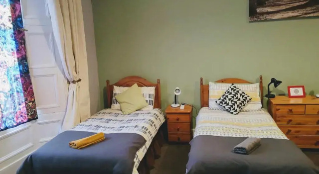 Кровать в общем номере aabAlree Guest House
