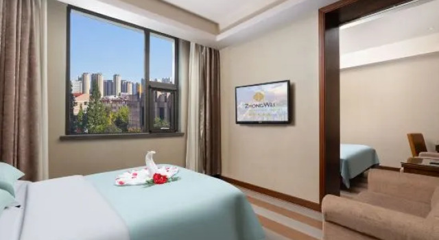 Люкс Linyi Ronghua Hotel (People's Square Railway Station)