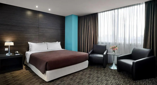 Апартаменты RELC International Hotel
