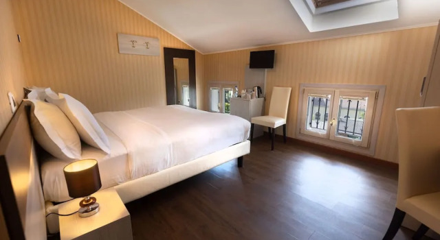 Номер Standard Мансарда c 1 комнатой с частичным видом Gardone Palace Hotel