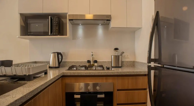 w Elegant 1BR Retreat in the Heart of San Isidro, Забронировать Апартаменты/квартира Сан-Исидро Лима