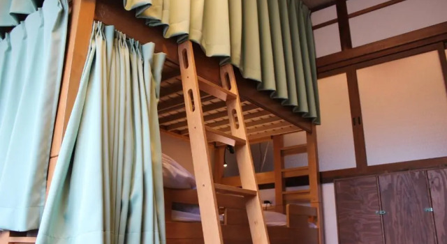 Кровать в общем номере Guesthouse KYOTO COMPASS