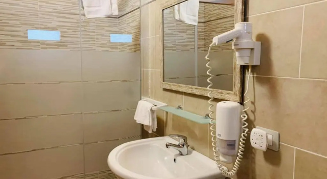 Трёхместный номер Standard TANIT Hotel Ristorante Storia del SulcisIglesiente
