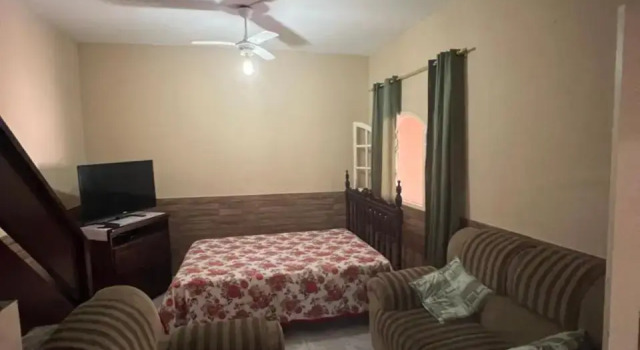 Casa com wi-fi e garagem a 5 minutos da Praia Grande