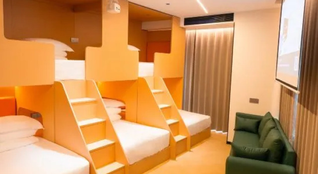 Кровать в общем номере Yueta H Esports Hotel (Wuxiang Shimao Center Branch)