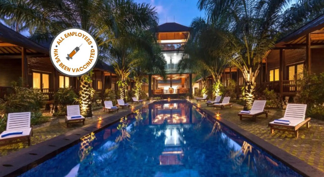 Кровать в общем номере Coconut Boutique Resort