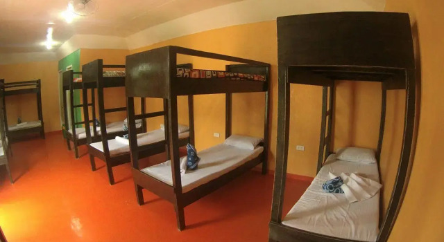 Кровать в общем номере Montenova Hillside Resort