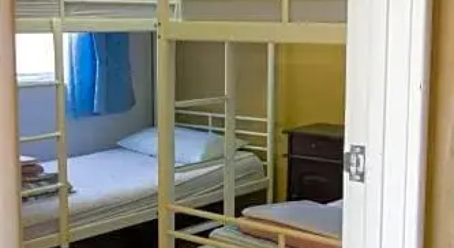 Кровать в общем номере Baywatch Retreat Augusta