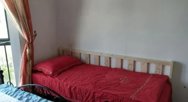 Bett im Wohnheim Yiju Hostel